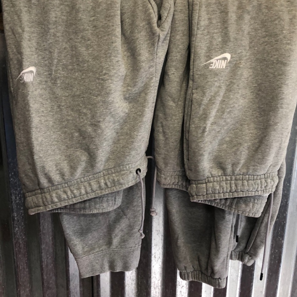 2 pair gray Nike joggers